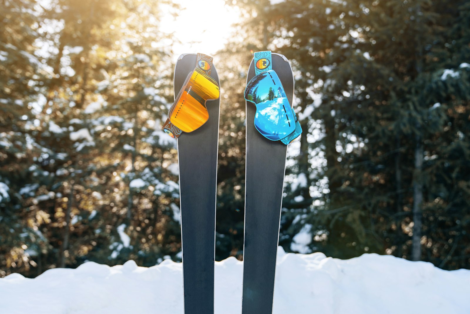 A pair of skis standing on snow-covered ground