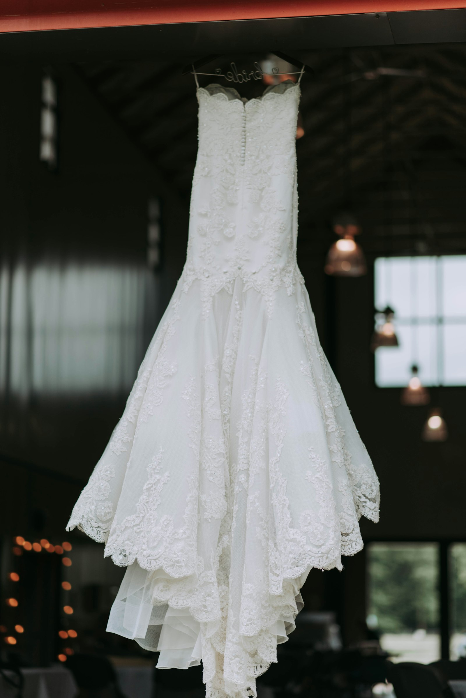 White strapless wedding dress on a clothes hanger